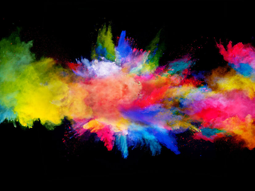 Explosion,Of,Colored,Powder,On,Black,Background